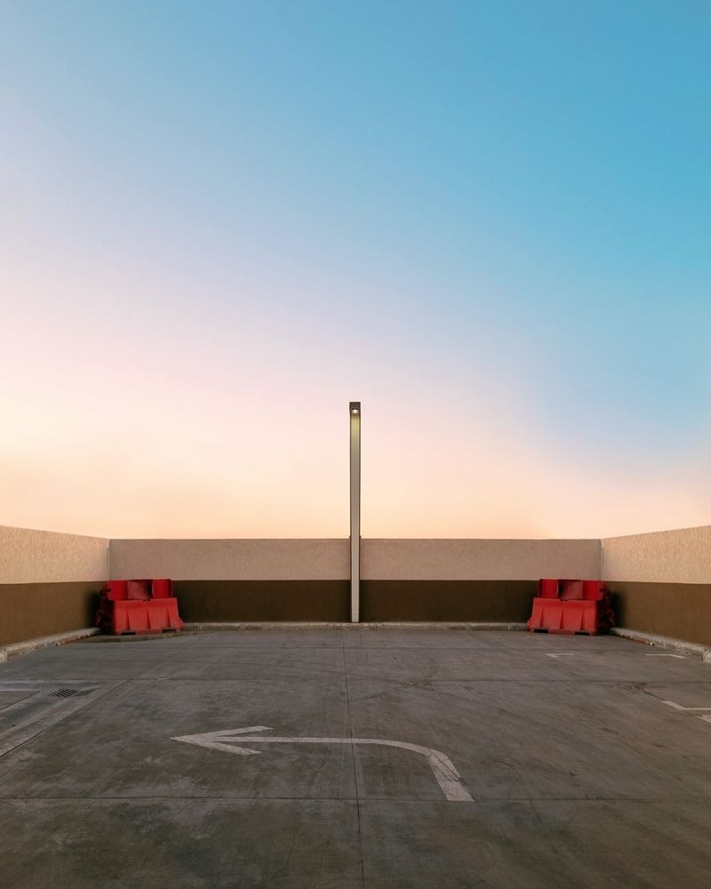 Open rooftop parking deck at sunset